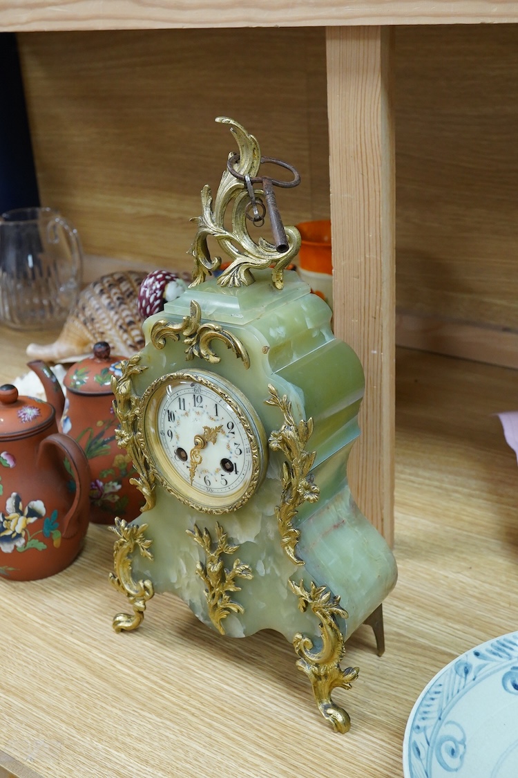 A Louis XV style onyx mantel timepiece, with key, 40cm high
